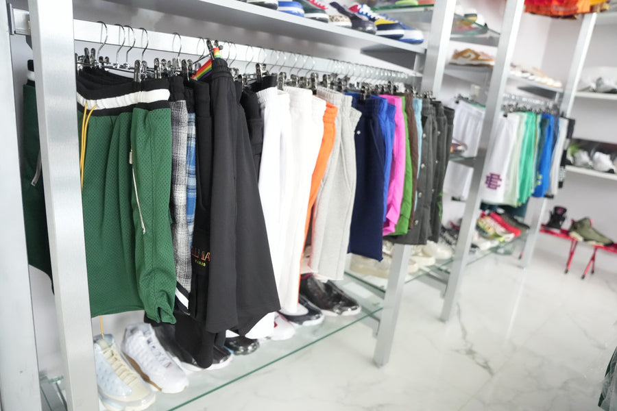 Racks of shorts and apparel at The Vault